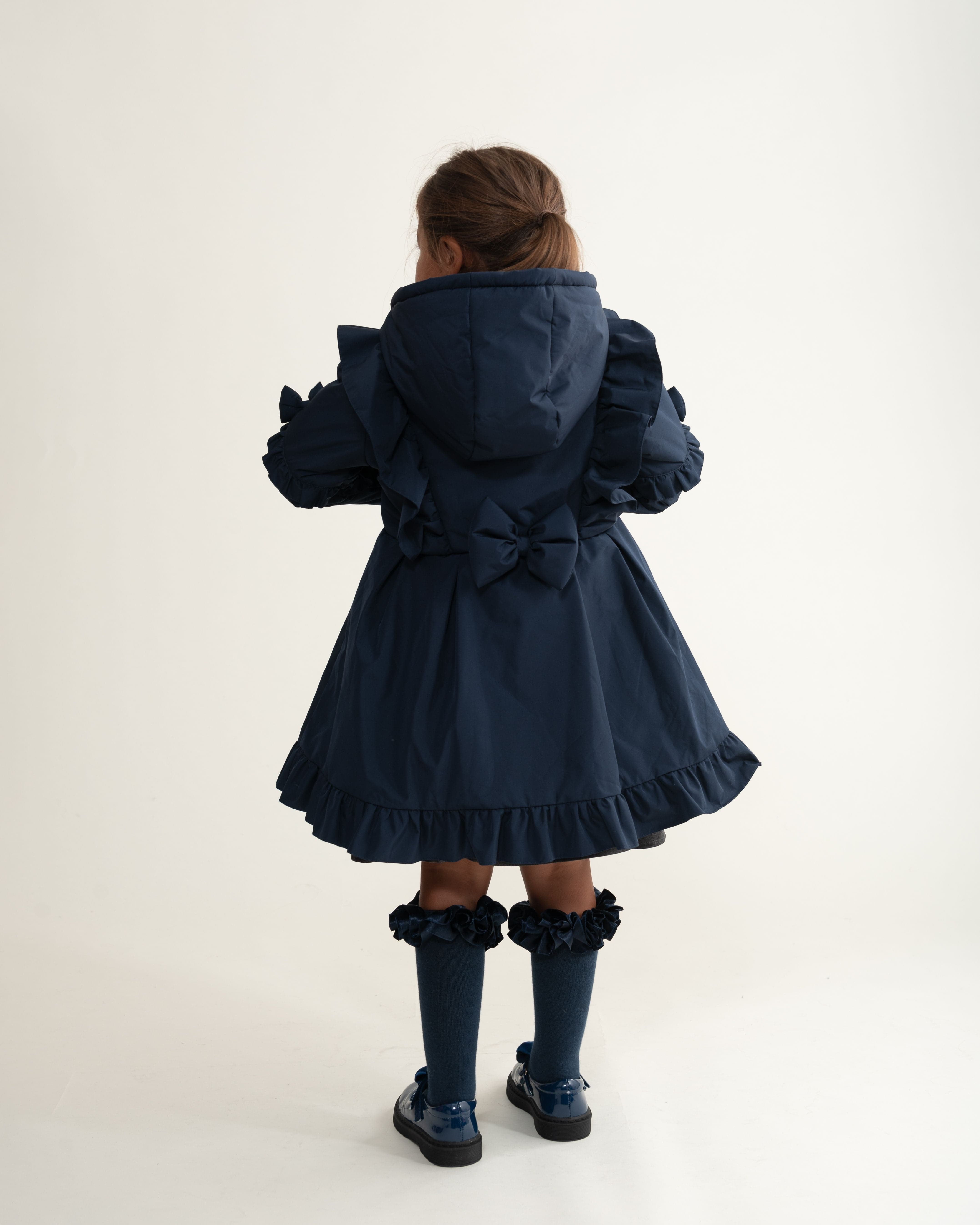 Caramelo Skirted Coat with Frill Detail