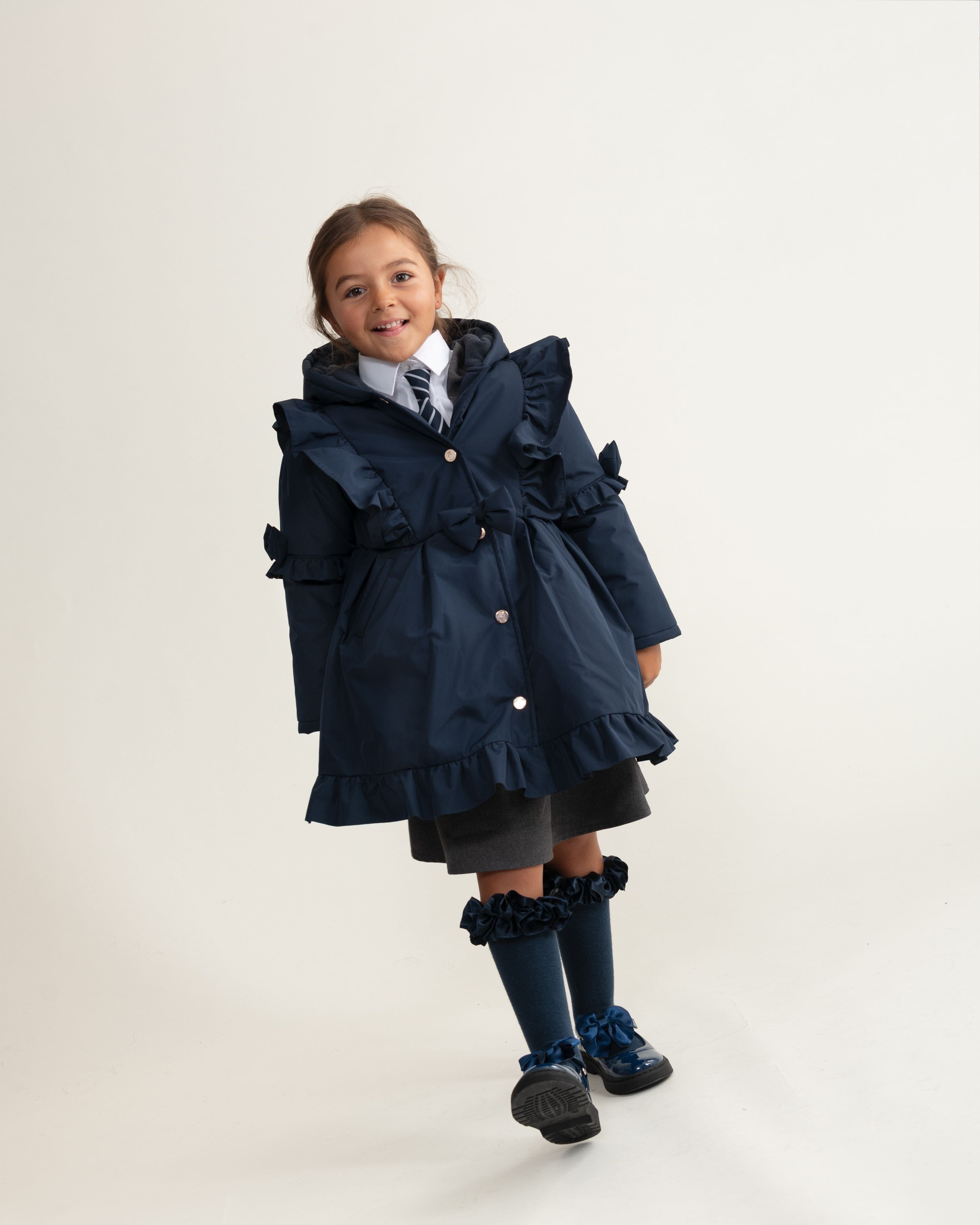 Caramelo Skirted Coat with Frill Detail